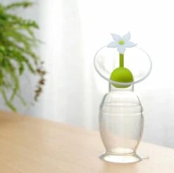 HAAKAA - Siliconen Borstkolf - 100ml + Stopper Witte Bloem - Borstvoeding - Lekschaal -Stokke Verkoop 1200x1196 15
