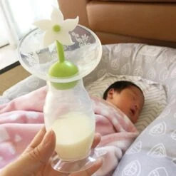 HAAKAA - Siliconen Borstkolf - 100ml + Stopper Witte Bloem - Borstvoeding - Lekschaal -Stokke Verkoop 1200x1200 1644